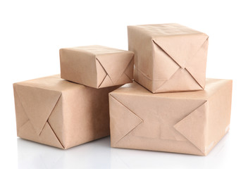 parcels boxes with kraft paper, isolated on white