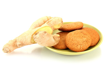 Ginger cookies with fresh ginger root isolated on white