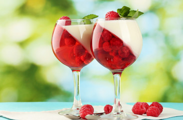 fruit jelly in glasses, berries and mint