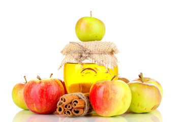 Honey and apples with cinnamon isolated on white