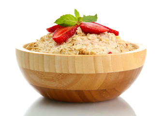 tasty oatmeal with strawberries, isolated on white