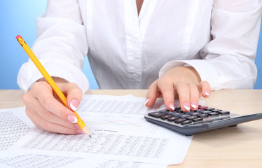 Closeup of businesswoman hands, working in office room