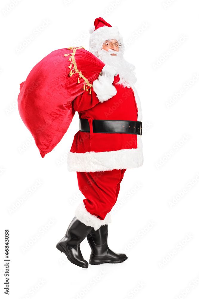 Sticker santa claus walking with bag full of gifts og his back