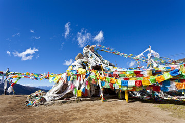 Colorful prayer flags and snow mountain