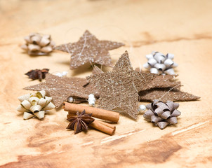 Christmas stars with bows and spices
