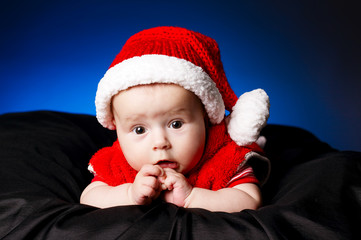 Little cute baby with santa hat