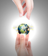 Social Network concept : hand hold earth of social network (Elem