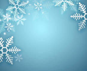 Fototapeta na wymiar Beautiful snowflake blue Christmas background with copyspace