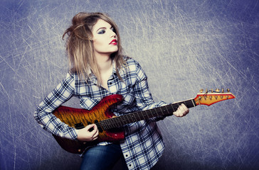 Style girl with guitar.