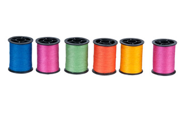 set of color threads on a white background