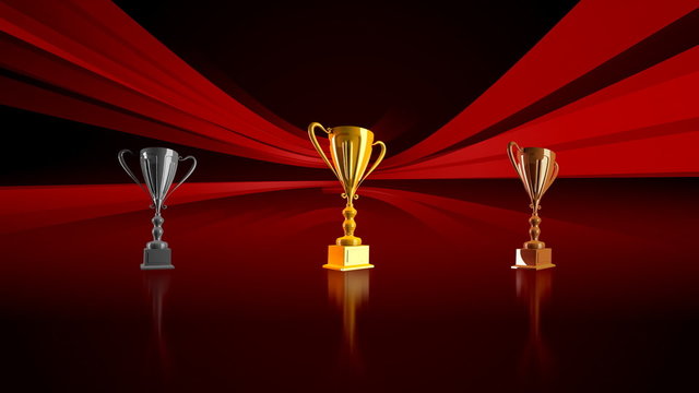 Three trophies on the red abstract background 