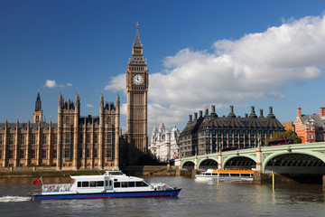 Big Ben with boats in   London, UK