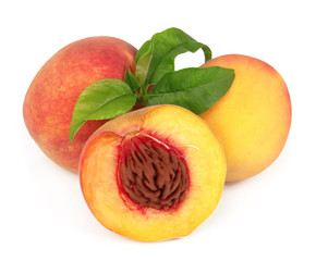 fresh peaches with leaves