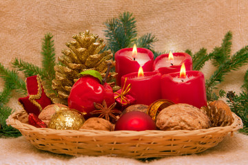 Four Advent candles and decoration. 