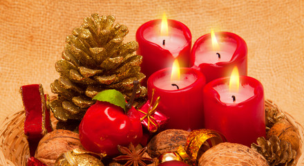 Four Advent candles and decoration. 