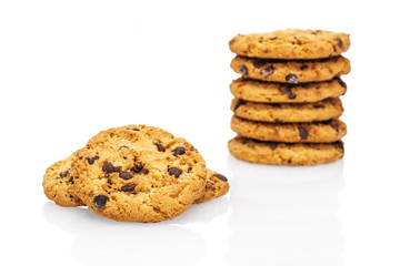 A stack of chocolate chip cookies isolated on a white background