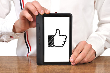 digital tablet in hand