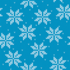 Snowflakes on knitted background