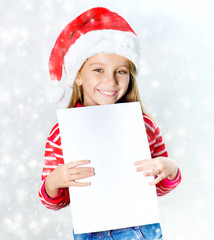 little girl in Santa Claus hat