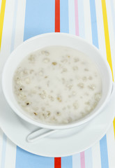 Thai rich nutrition dessert, millet with coconut milk in bowl
