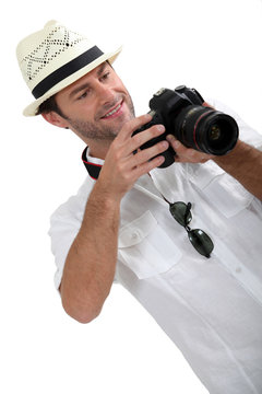 man with DSLR camera