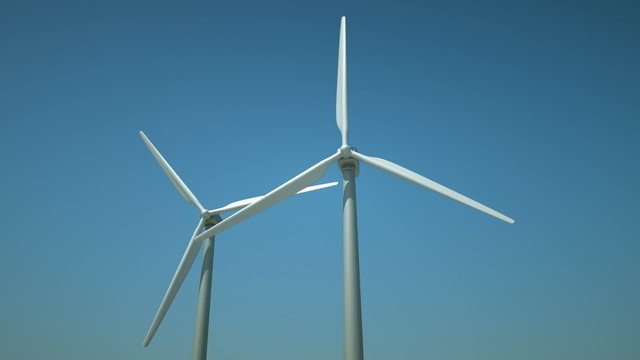 Turbines in a windfarm generating alternative energy.