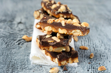 Homemade peanut caramel and chocolate bars