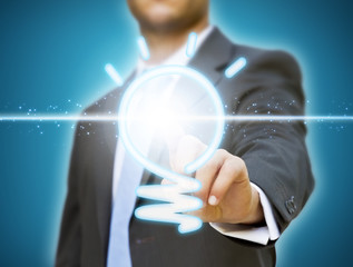 Businessman lightbulb idea concept