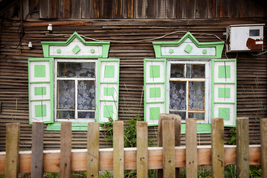 Typical wooden windows of a house on Lake Baikal in Russia