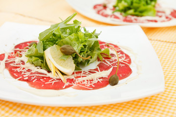 Meat Carpaccio with Parmesan Cheese