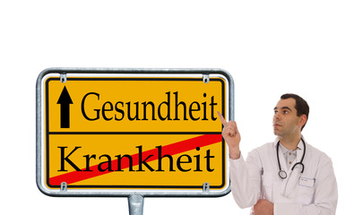 Arzt zeigt auf Schild - Gesundheit