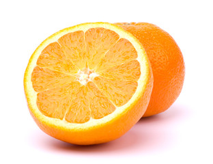 Whole and cut oranges islotaed on white background