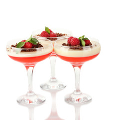 fruit jelly with chocolate and raspberries in glasses isolated