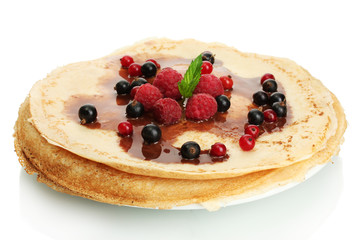 Delicious pancakes with berries and chocolate