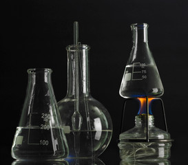 spiritlamp and test-tubes on blue background