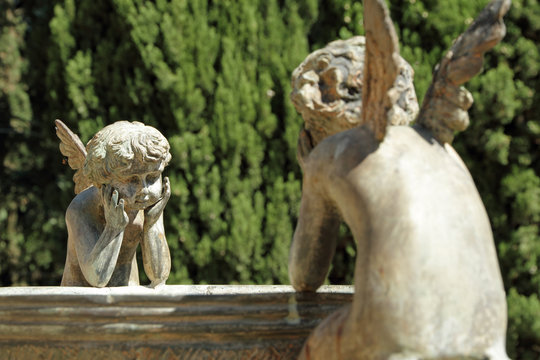 two angels - detail from garden of Villa Peyron in Fiesole