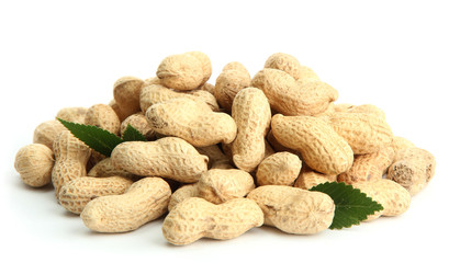 tasty peanuts with leaves, isolated on white