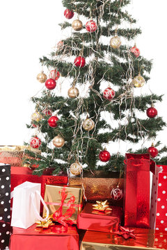 Christmas Tree and Gifts. Over white background.