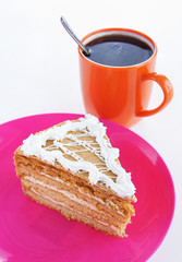 Triangle cake and cup of coffee