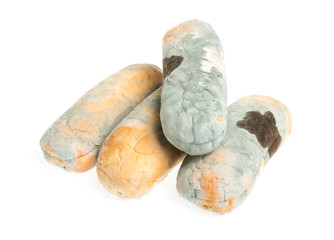 Old musty bread covered with green mold