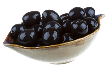 Olives black watered with olive oil in a bowl isolated on a whit