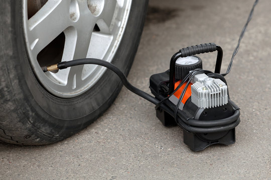 air compressor for car  wheels in working position