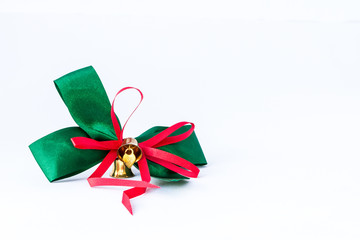 green ribbon with gold bell