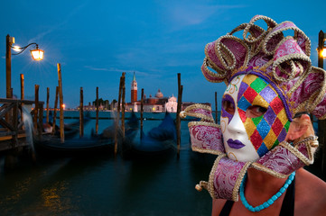 Venice, Italy - Carnival. Gondolas  in background