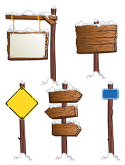 set of wooden road signs