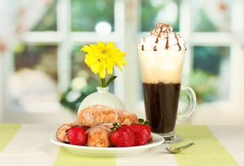 delicious bagels and fresh coffee on the table close-up