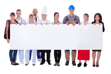 Group of diverse professional people with a banner