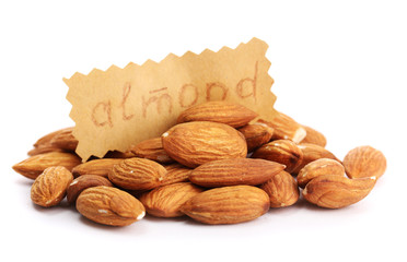 tasty almonds nuts, isolated on white