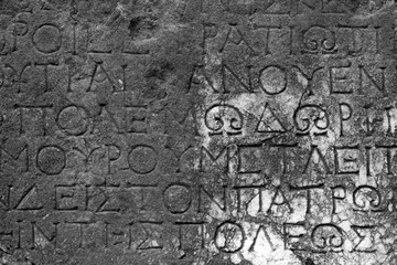 A Greek inscription carved in stone at ancient ruins