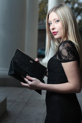Young caucasian woman with empty wallet